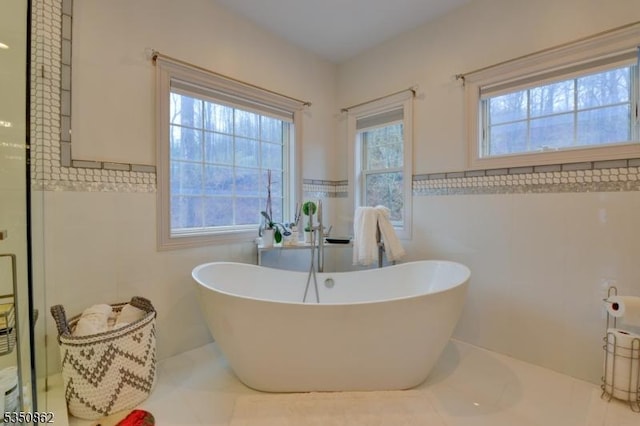 1 Dock Watch Hollow Rd, Warren Twp, NJ 07059 - full bathroom with tile walls, a soaking tub, tile patterned flooring, and a wainscoted wall