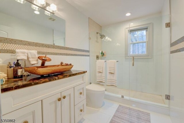 1 Dock Watch Hollow Rd, Warren Twp, NJ 07059 - bathroom featuring a shower stall, toilet, vanity, and tile patterned floors