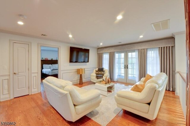 1 Dock Watch Hollow Rd, Warren Twp, NJ 07059 - living area featuring french doors, crown molding, light wood-style flooring, recessed lighting, and a decorative wall