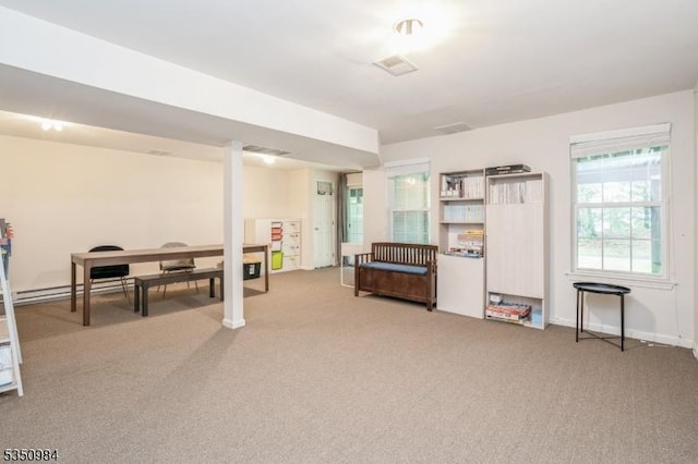 recreation room with carpet floors and baseboards