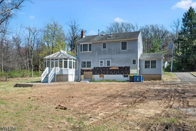 187 Mount Horeb Rd, Warren Twp, NJ 07059 - back of house with a chimney, a sunroom, and cooling unit