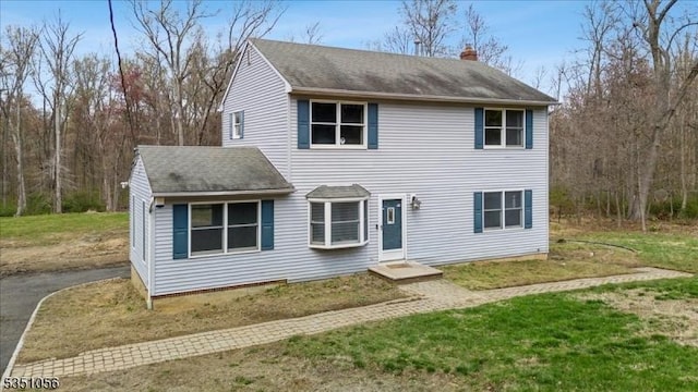 187 Mount Horeb Rd, Warren Twp, NJ 07059 - traditional-style house featuring a chimney, a shingled roof, and a front yard