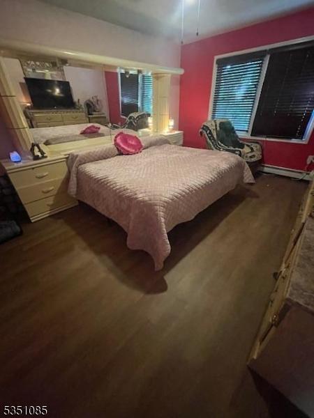 26 Wyker Rd, Franklin Boro, NJ 07416 - bedroom with wood finished floors and ceiling fan