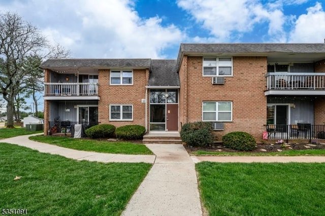 807 Eves Dr Unit 3P, Hillsborough Twp, NJ 08844 - view of front facade with a balcony, a front lawn, and brick siding