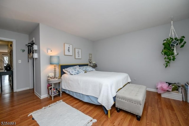 807 Eves Dr Unit 3P, Hillsborough Twp, NJ 08844 - bedroom with wood finished floors and baseboards