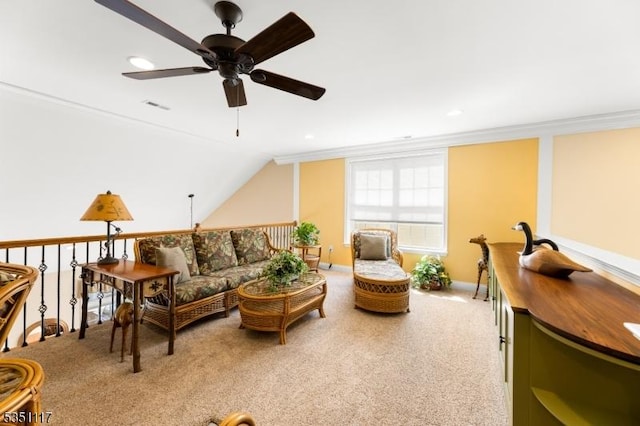 living area with carpet floors, ceiling fan, visible vents, and ornamental molding