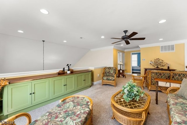 interior space featuring crown molding, a ceiling fan, recessed lighting, and visible vents