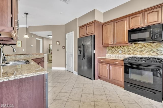 kitchen with black appliances, a sink, backsplash, light stone counters, and light tile patterned floors