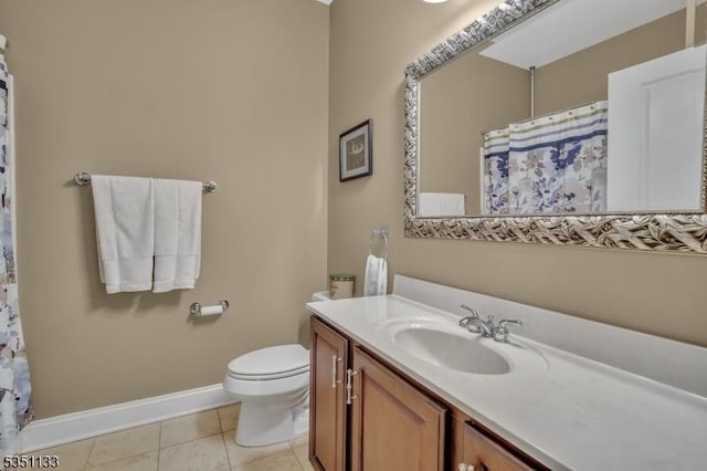 bathroom featuring toilet, vanity, tile patterned flooring, baseboards, and curtained shower