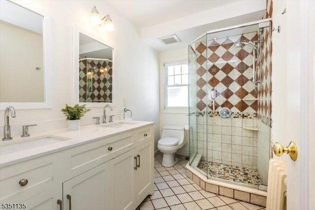 full bathroom featuring tile patterned flooring, a sink, radiator, and a stall shower