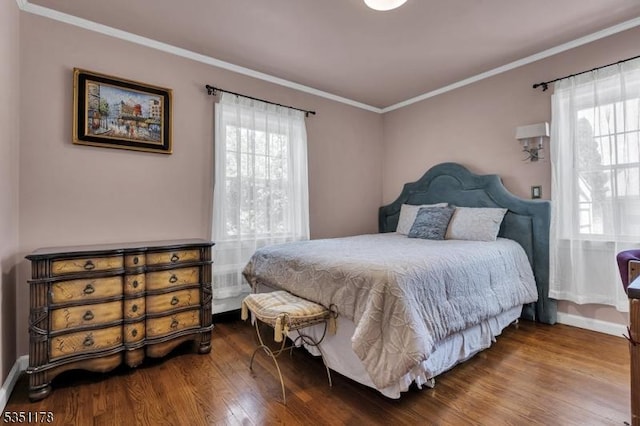 106 Anderson St, Raritan Boro, NJ 08869 - bedroom featuring wood finished floors, ornamental molding, and baseboards