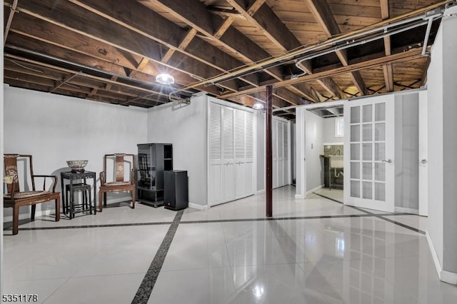 106 Anderson St, Raritan Boro, NJ 08869 - finished basement featuring baseboards and tile patterned floors