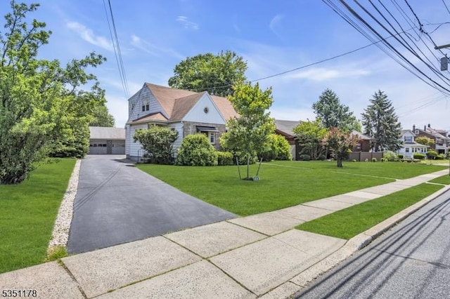 106 Anderson St, Raritan Boro, NJ 08869 - view of front facade with a front yard and a garage