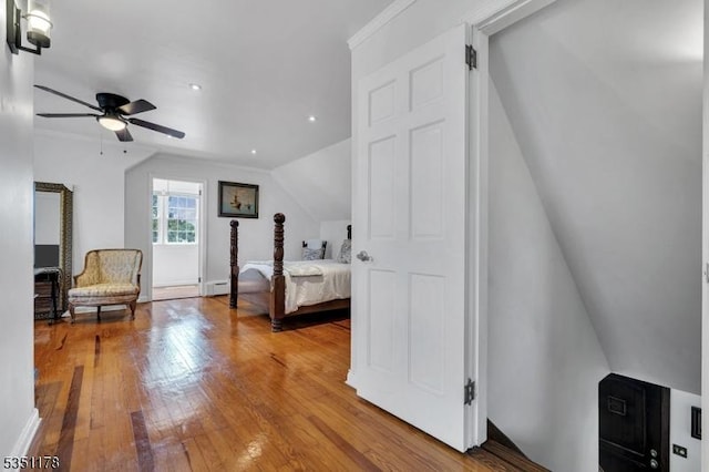 106 Anderson St, Raritan Boro, NJ 08869 - bedroom with wood-type flooring, vaulted ceiling, and recessed lighting