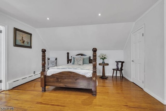 106 Anderson St, Raritan Boro, NJ 08869 - bedroom with vaulted ceiling, baseboard heating, light wood-style flooring, and baseboards