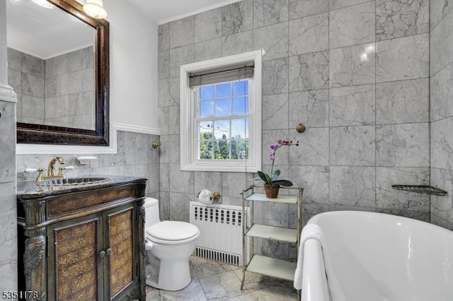 106 Anderson St, Raritan Boro, NJ 08869 - full bath with radiator heating unit, tile walls, a freestanding tub, marble finish floors, and vanity