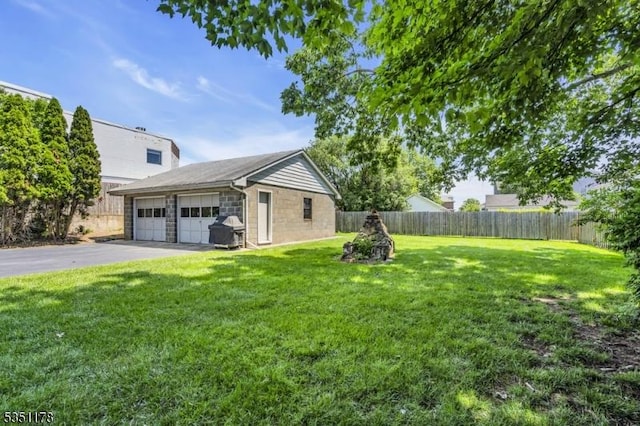 106 Anderson St, Raritan Boro, NJ 08869 - view of yard featuring an outdoor structure and a detached garage