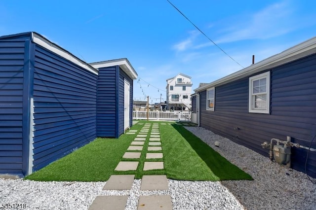 view of yard featuring fence