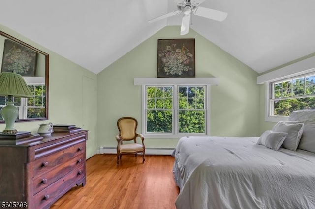 484 Rte 518, Montgomery Twp, NJ 08558 - bedroom with light wood-style floors, vaulted ceiling, a baseboard radiator, and ceiling fan