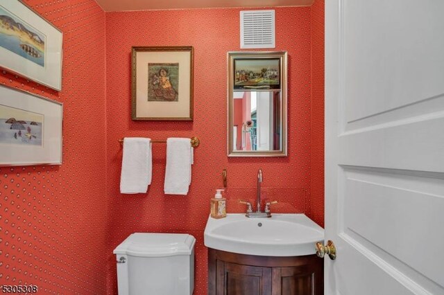 484 Rte 518, Montgomery Twp, NJ 08558 - half bathroom featuring toilet and vanity