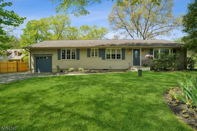 single story home with a garage and driveway