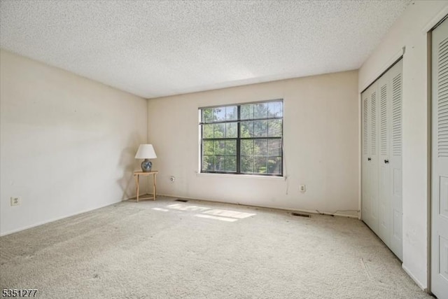 417 Penns Way, Bernards Twp, NJ 07920 - unfurnished bedroom featuring carpet floors and a textured ceiling