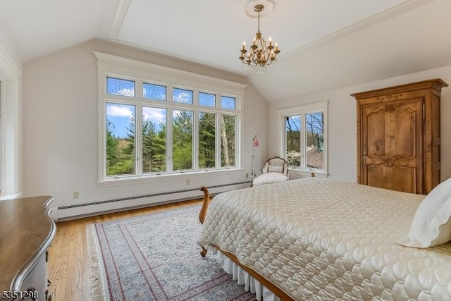 bedroom with a baseboard radiator, lofted ceiling, wood finished floors, and a chandelier