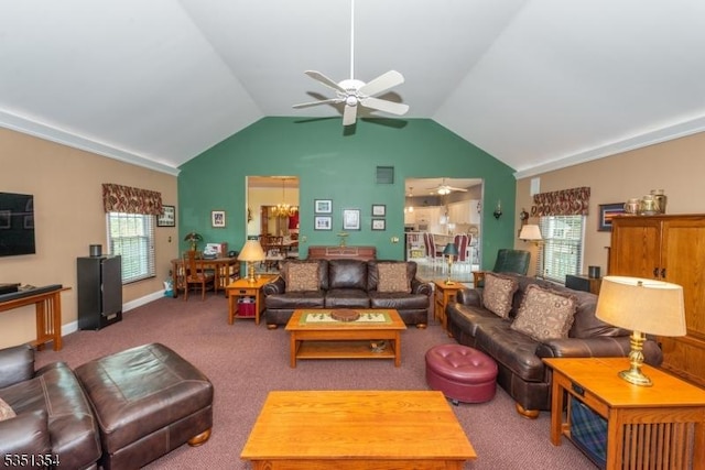 carpeted living area with baseboards, a ceiling fan, and vaulted ceiling