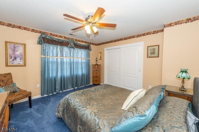 carpeted bedroom featuring baseboards, ceiling fan, and a closet