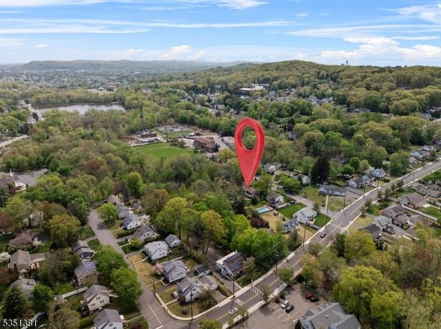 aerial view with a view of trees and a residential view