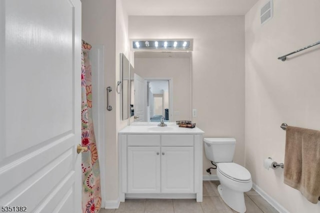 full bath featuring tile patterned flooring, visible vents, toilet, vanity, and baseboards