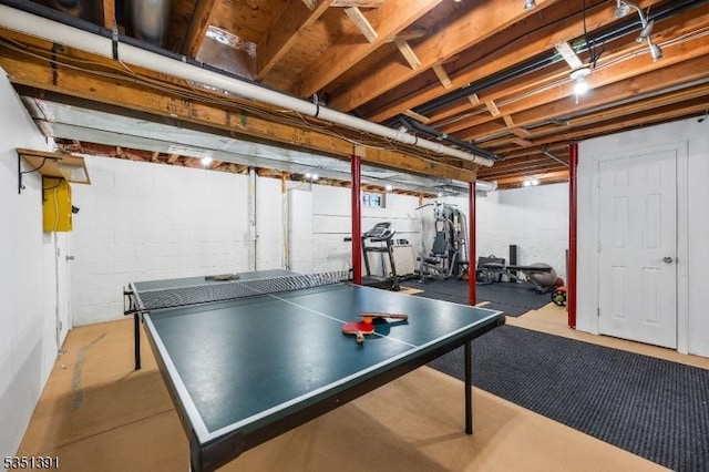 playroom with concrete block wall