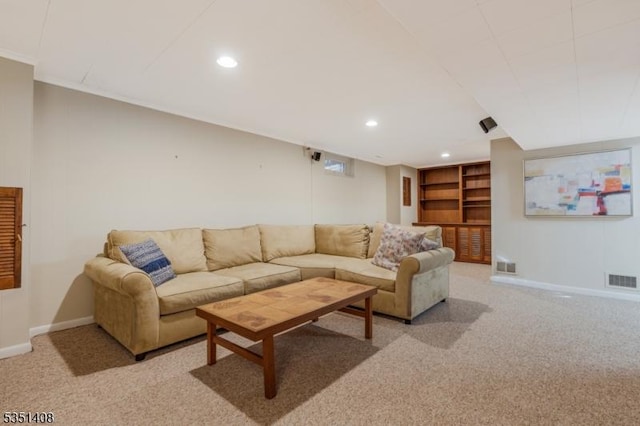 living room with recessed lighting, baseboards, visible vents, and light carpet