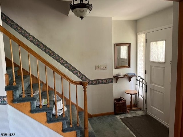 stairway with baseboards