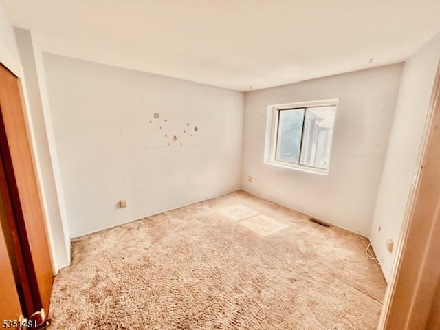 57 Kensington Ct, Washington Twp, NJ 07840 - carpeted spare room with visible vents