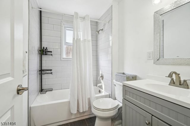 full bathroom with shower / bath combo, toilet, vanity, and wood finished floors