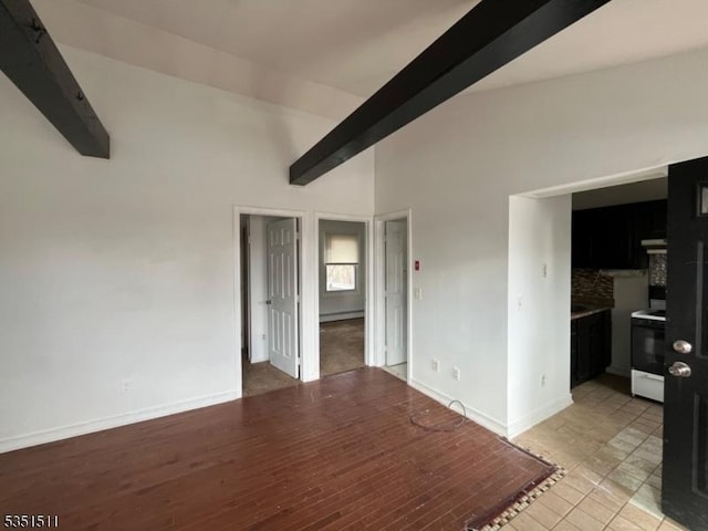 244 Dupont Ave, Hopatcong Boro, NJ 07843 - empty room with baseboards, baseboard heating, and lofted ceiling with beams
