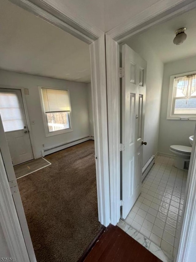 244 Dupont Ave, Hopatcong Boro, NJ 07843 - corridor featuring a baseboard heating unit and baseboards