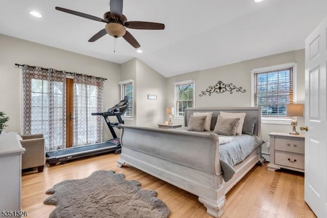 bedroom featuring recessed lighting, multiple windows, and light wood-type flooring