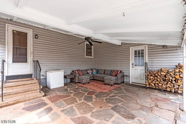 view of patio featuring an outdoor hangout area, entry steps, and a ceiling fan