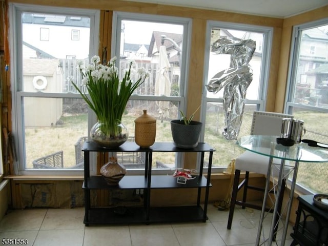 dining space featuring tile patterned floors and a wealth of natural light