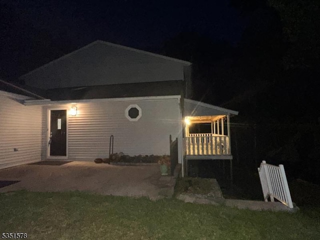 29 Windy Bush Ln, Sparta Twp, NJ 07871 - view of back of house at night