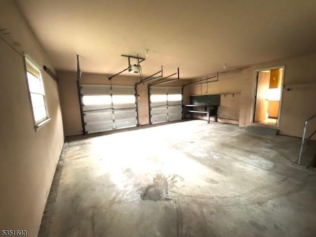 garage featuring a garage door opener