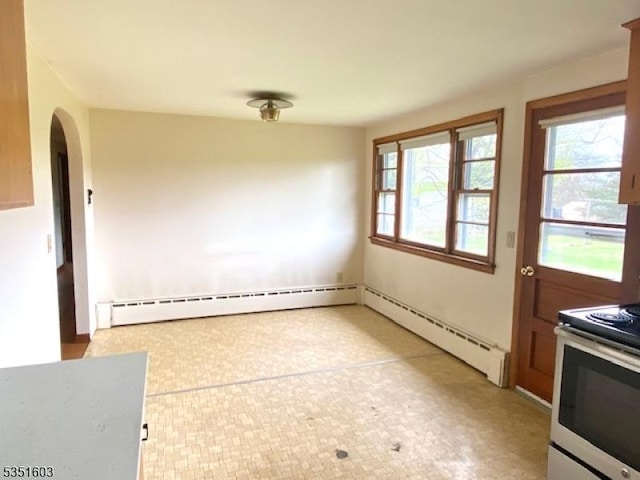 unfurnished dining area featuring arched walkways, light floors, and a baseboard radiator