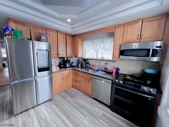 79 Shaler Ave, Fairview Boro, NJ 07022 - kitchen with stainless steel appliances, a tray ceiling, dark countertops, backsplash, and ornamental molding