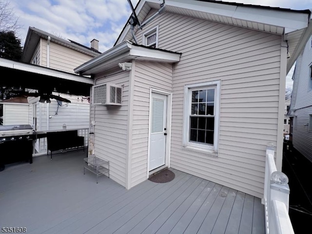 79 Shaler Ave, Fairview Boro, NJ 07022 - wooden deck with a wall mounted air conditioner and area for grilling