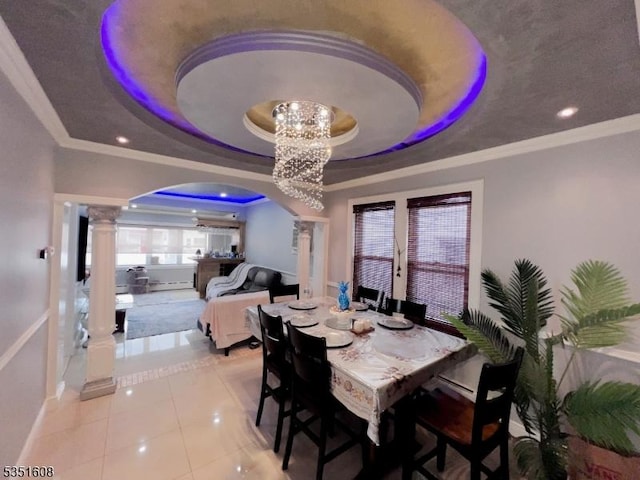 79 Shaler Ave, Fairview Boro, NJ 07022 - dining space with decorative columns, arched walkways, french doors, a raised ceiling, and light tile patterned flooring