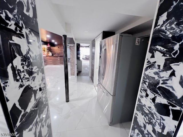 79 Shaler Ave, Fairview Boro, NJ 07022 - hallway with light marble finish floors
