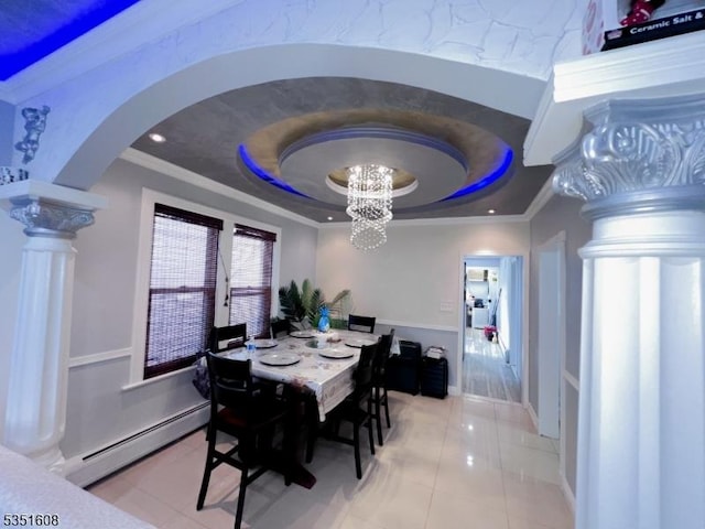 79 Shaler Ave, Fairview Boro, NJ 07022 - dining room with a baseboard radiator, a tray ceiling, decorative columns, arched walkways, and light tile patterned flooring