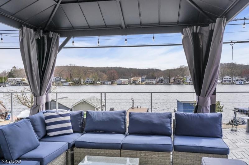 33 S Lakeside Ave, Jefferson Twp, NJ 07849 - view of patio / terrace with an outdoor hangout area, a balcony, and a water view